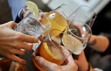 people cheersing drinks